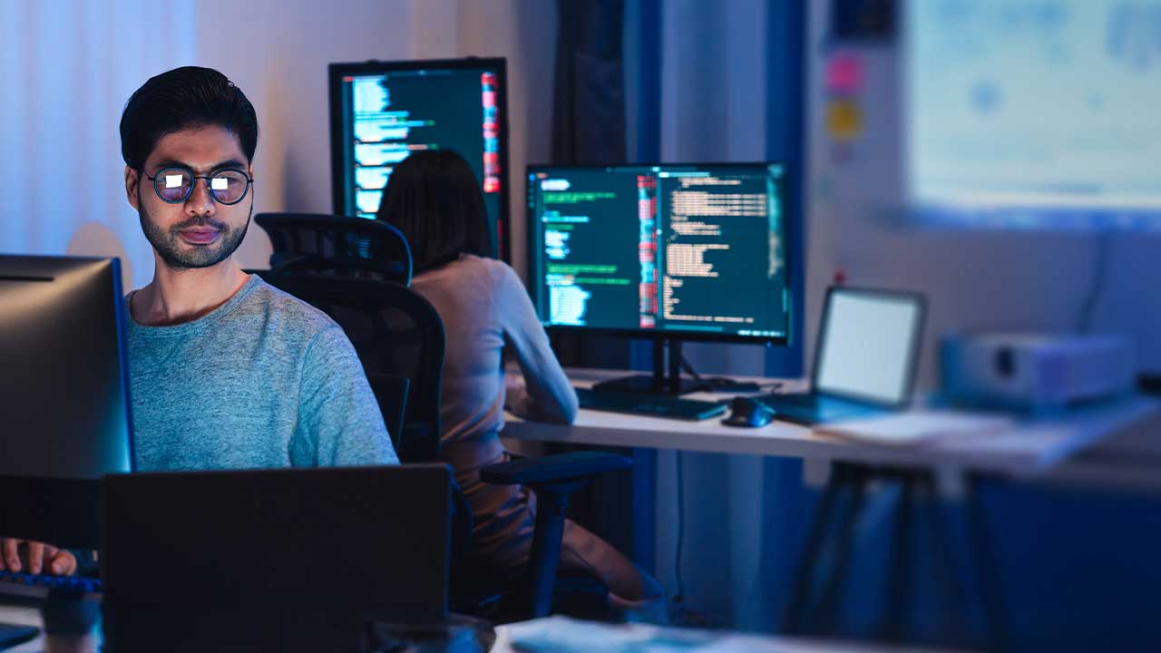 man using cloud-based real estate document management software